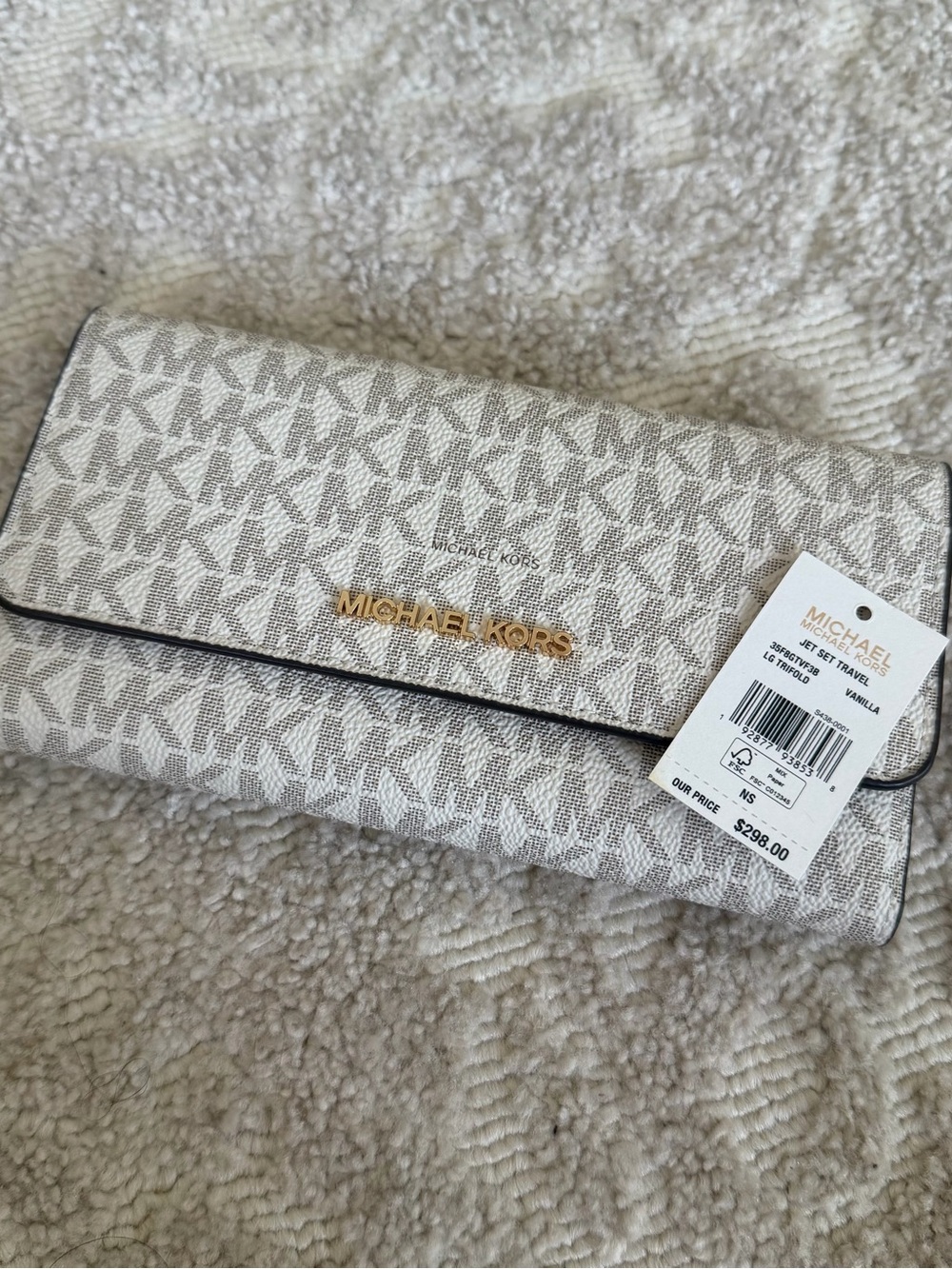 Michael Kors Jet Set Large Logo Trifold Wallet - Vanilla

BRAND NEW